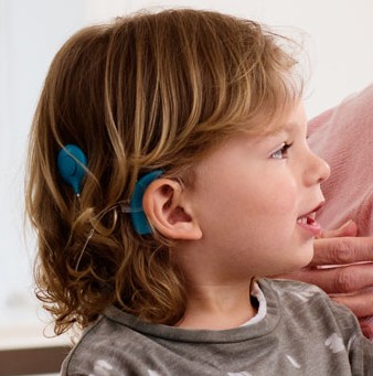 A boy with a cochlear implant