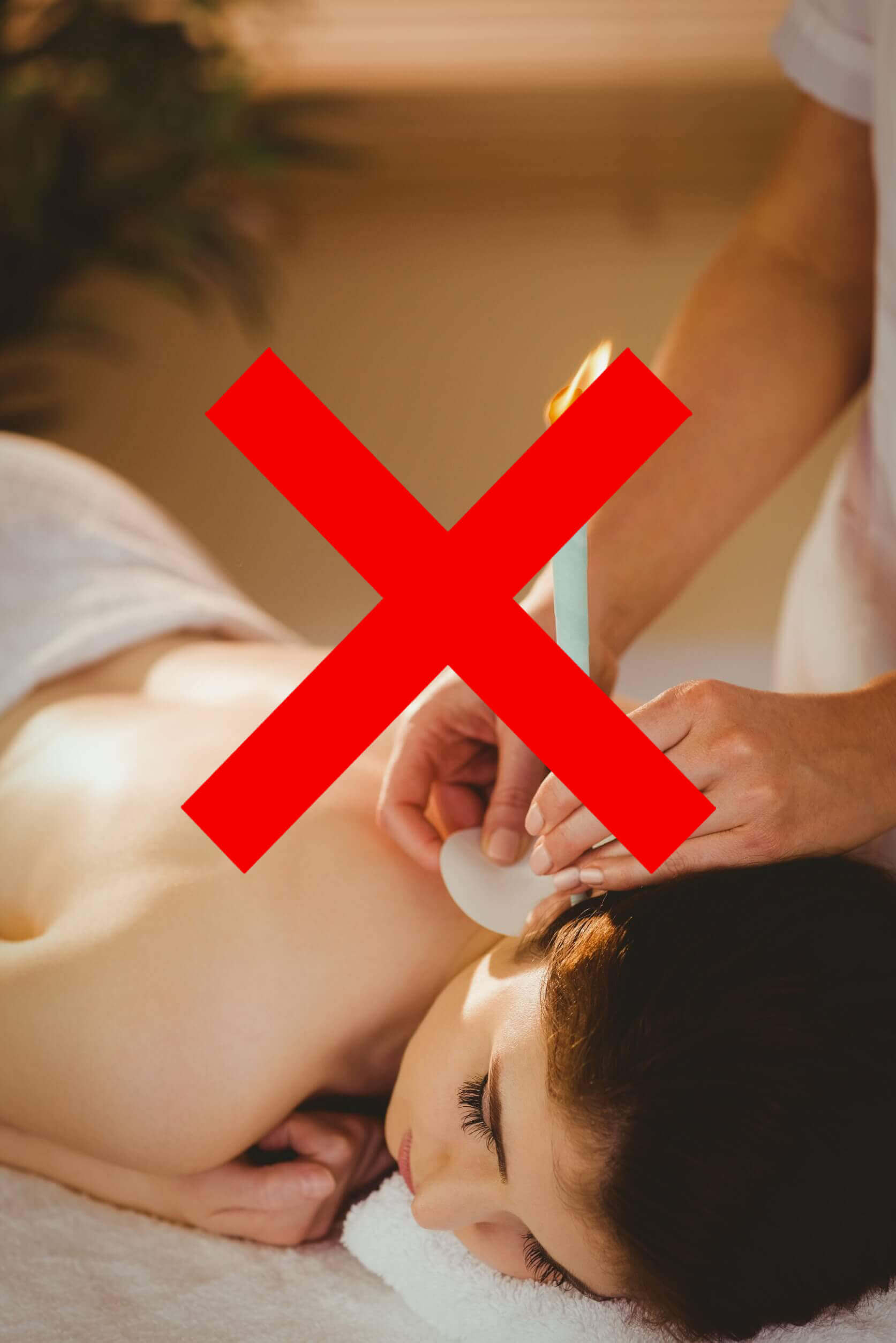 Woman using ear candling to remove earwax. There is a red x.