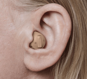 Half shell hearing aid shown in the ear