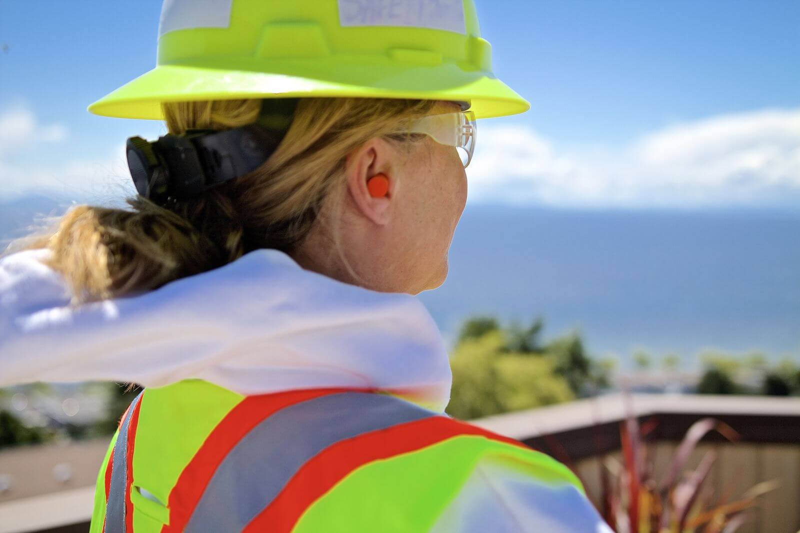 worker wearing hearing protection ear rmuffs